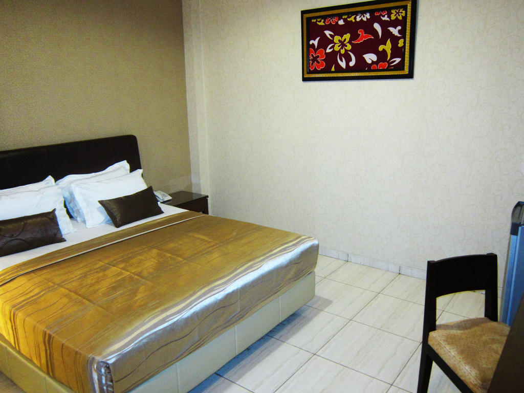 Hotel C3 Semarang Pokoj fotografie